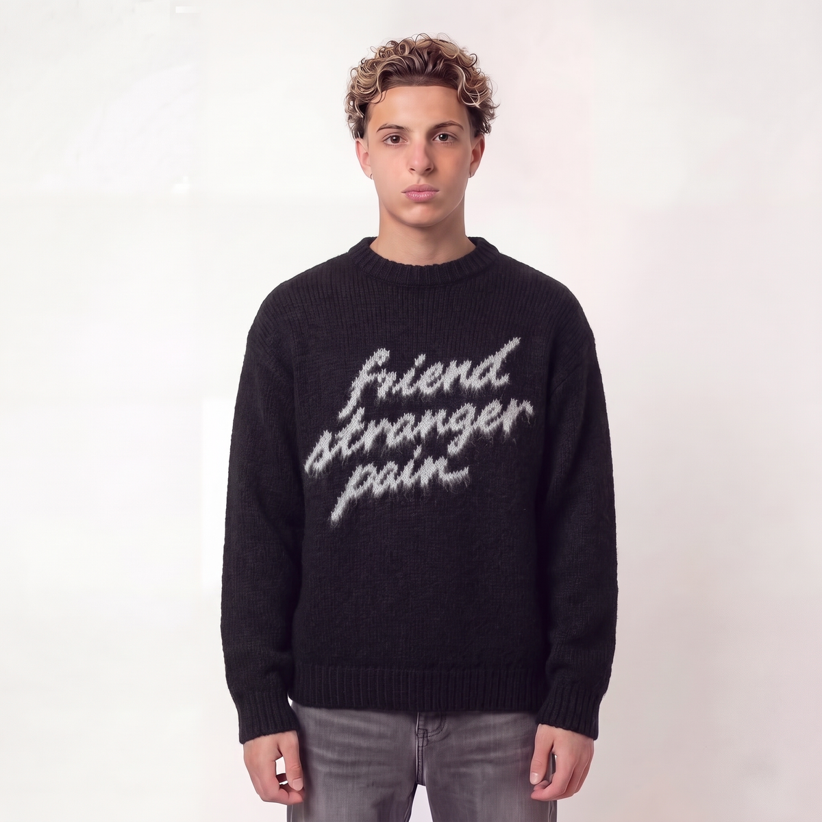 STRANGER black knit sweater on model, friend stranger pain
