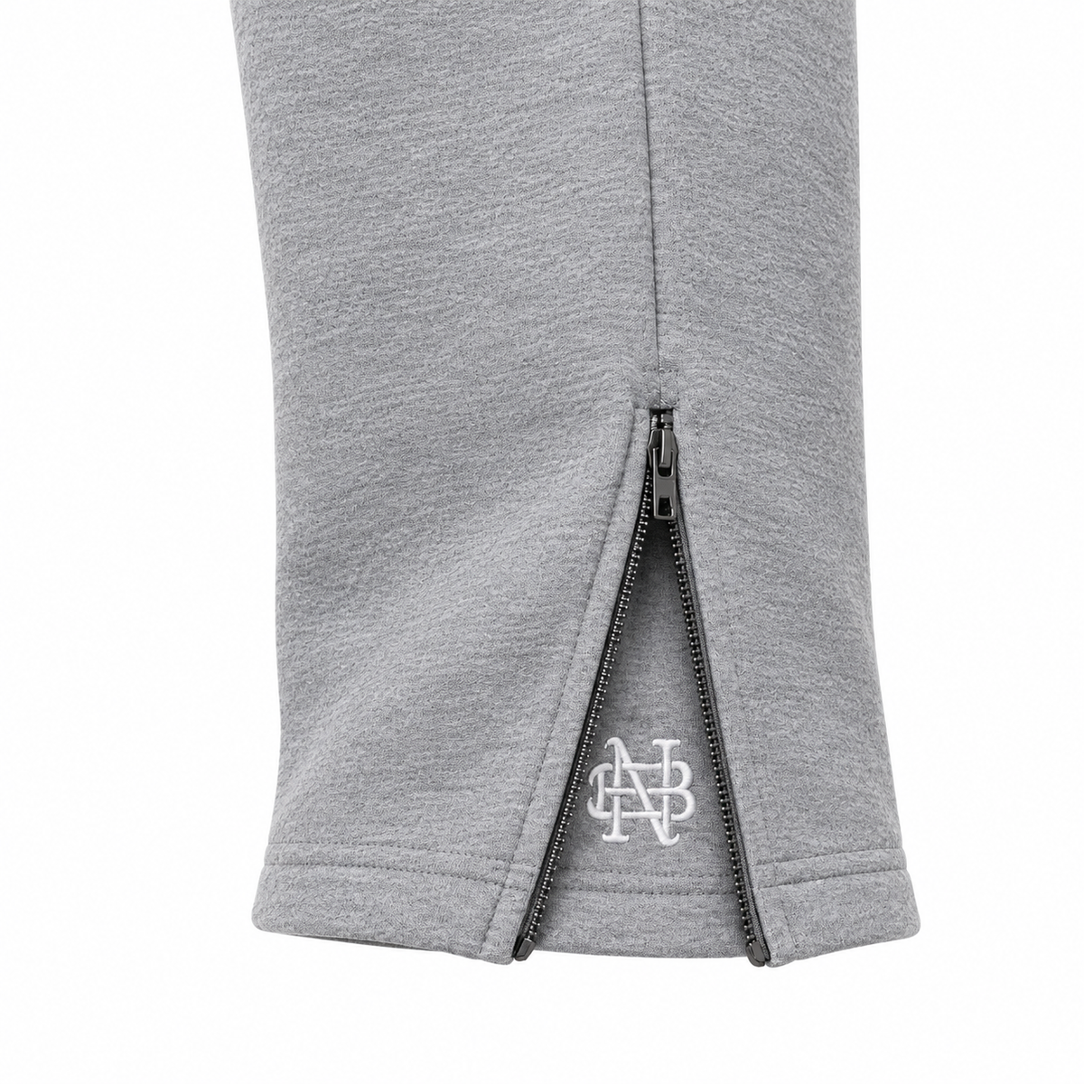 FALLON ankle zipper and embroidered gusset detail